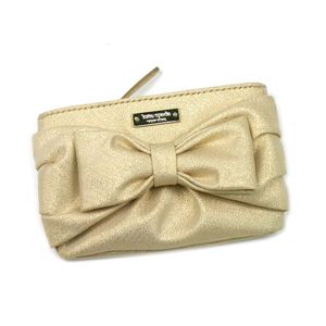 kate spade(ケイトスペード）小銭入れ PLAZA　SEASONAL PWRU1231B BOW　COIN　PURSE ゴールド